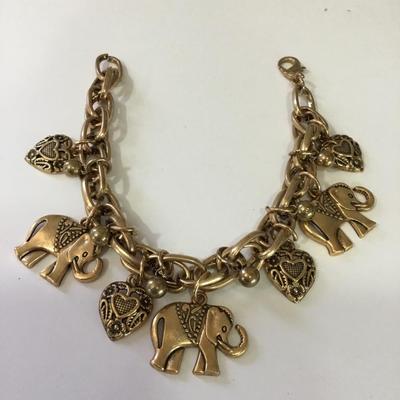 Cute gold tone, elephant, heart charm bracelet