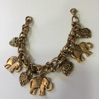 Cute gold tone, elephant, heart charm bracelet
