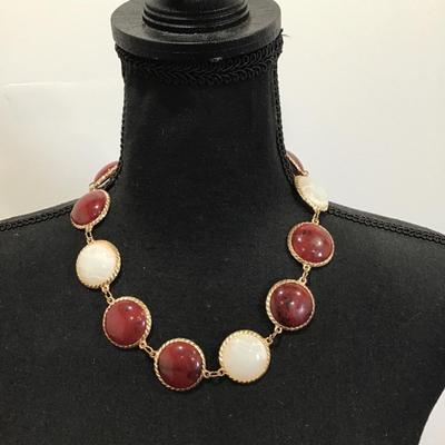 Gold tone necklace with white and maroon Cabachon
