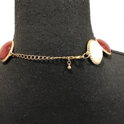 Gold tone necklace with white and maroon Cabachon