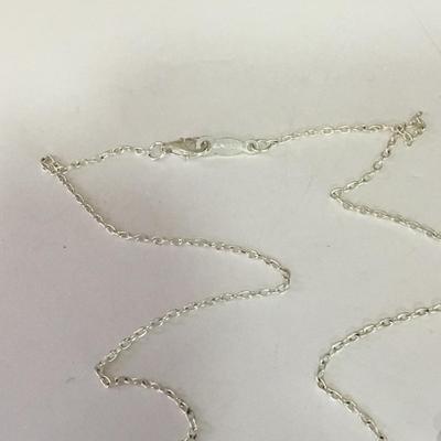 Beautiful sterling, silver CZ earrings, and pendant beautiful