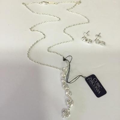 Beautiful sterling, silver CZ earrings, and pendant beautiful