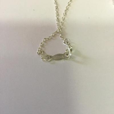 Beautiful sterling, silver CZ earrings, and pendant beautiful