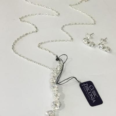 Beautiful sterling, silver CZ earrings, and pendant beautiful