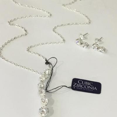 Beautiful sterling, silver CZ earrings, and pendant beautiful
