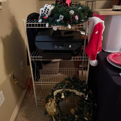 Sale Photo Thumbnail #201: Two wreaths (printer and shelf not included), Items on table. (Table and display shelves are not included)
