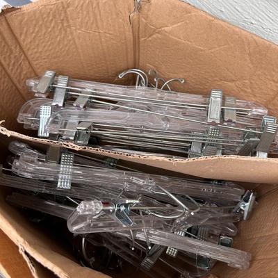 Lot of plastic Retail Hangers - Mostly Pants Hangers 