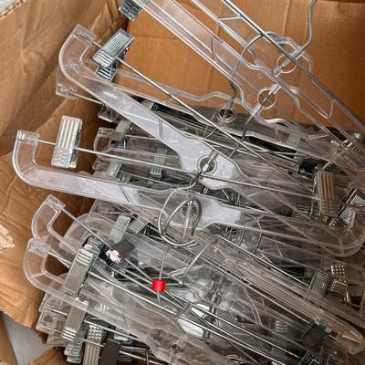 Lot of plastic Retail Hangers - Mostly Pants Hangers 