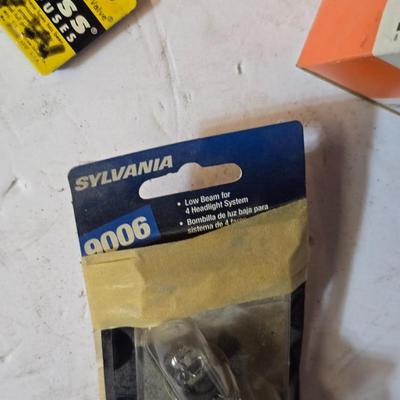 Vintage Auto Parts Lot – Spark Plugs, Distributor Cap, Fuses, Light Bulb, and More