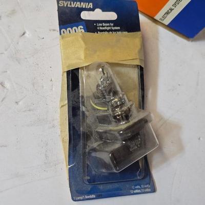 Vintage Auto Parts Lot – Spark Plugs, Distributor Cap, Fuses, Light Bulb, and More