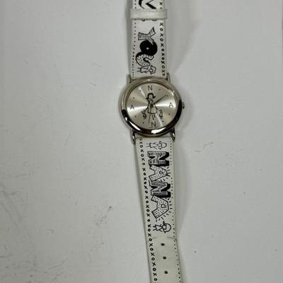 Sale Photo Thumbnail #106: Silver tone dial, white band with inscription. Needs a new battery.