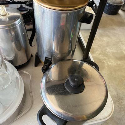 Sale Photo Thumbnail #31: Tea pots,  cast iron skillet, small appliances and more.