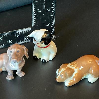 Vintage small ceramic dogs, one has a stamp