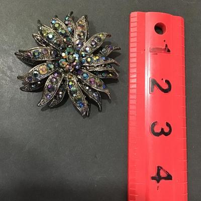 Sale Photo Thumbnail #44: trio Layered flower Brooch 
Gunmetal with AB rhinestones 
Please see attached photos