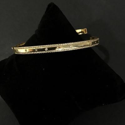 Sale Photo Thumbnail #76: Gold tone hinged Bracelet with small rhinestones 
Please see attached photos