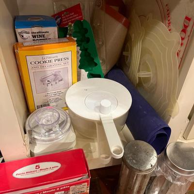 Sale Photo Thumbnail #89: Cookie sheets, cookie cutters, Cookie 
press, cake pans, and more.