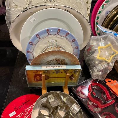 Sale Photo Thumbnail #105: Cookie Cutters, Platters, Plates 

 Plate Holders not included