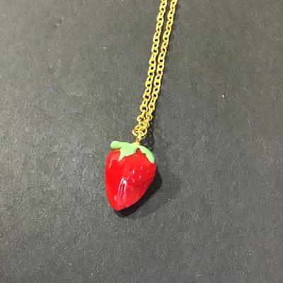 Sale Photo Thumbnail #129: Gold tone chain with glass strawberry pendant 
Please see attached photos
