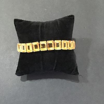 Sale Photo Thumbnail #156: Gold tone fashion stretch bracelet 
Like new 
Please see attached photos