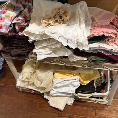 Sale Photo Thumbnail #130: Table cloths dish towels, napkins and placemats.