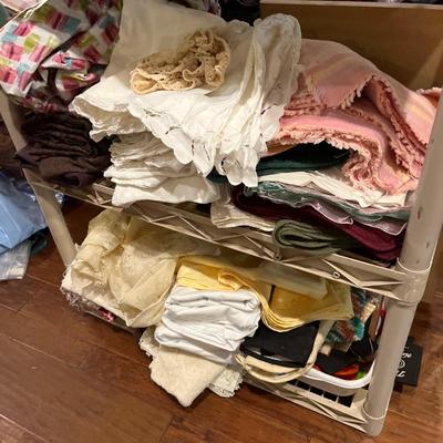 Sale Photo Thumbnail #128: Table cloths dish towels, napkins and placemats.
