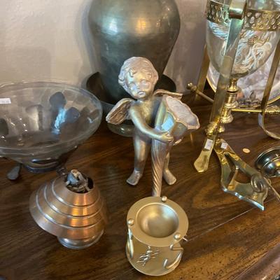 Sale Photo Thumbnail #133: Brass items and more

Cabinet not included