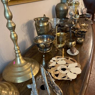 Sale Photo Thumbnail #132: Brass items and more

Cabinet not included