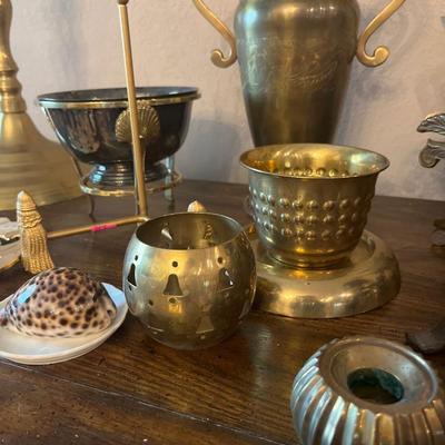 Sale Photo Thumbnail #136: Brass items and more

Cabinet not included