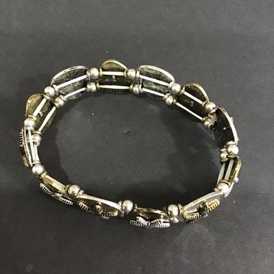 Siver and gold toned star fish stretch bracelet