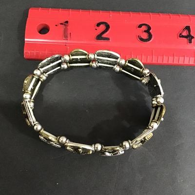 Siver and gold toned star fish stretch bracelet