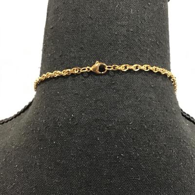 Gold tone chain with gold tone Carlo biagi coin pendant with rhinestones