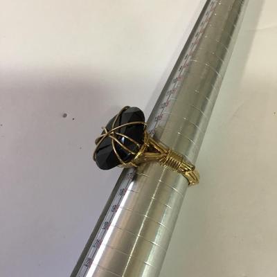 Cool handcrafted, gold, toned, black, onyx, or glass fashion ring