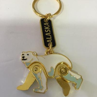 Nice cute enameled and gold toned, Alaska polar bear keychain articulating