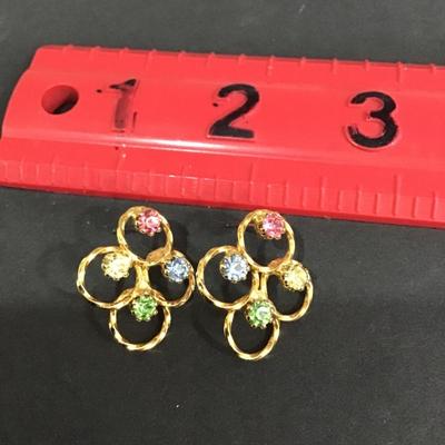 Gold tone, multi colored rhinestone. studded earrings