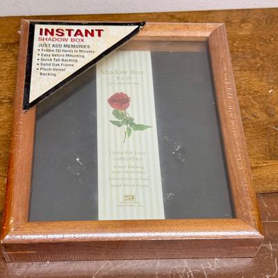 Sale Photo Thumbnail #1: Oak frame, velvet backing.  8” x 10”. New in original shrink wrap.