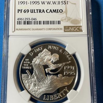 NGC CERTIFIED WWII 1991-1995 W PROOF69 ULTRA CAMEO GRADED SILVER DOLLAR AS PICTURED. (COIN #046).