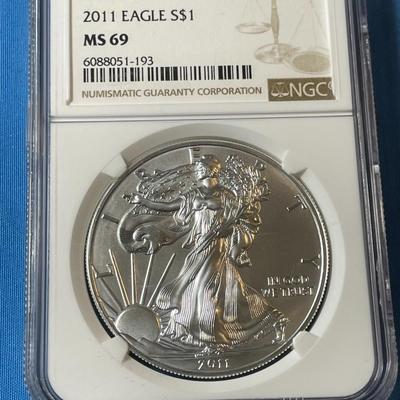 NGC CERTIFIED 2011 MS69 GRADED SILVER EAGLE DOLLAR 25TH ANNIVERSARY EDITION .999 SILVER AS PICTURED. (COIN #193).