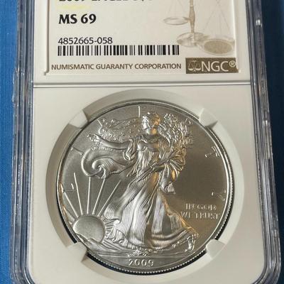 NGC CERTIFIED 2009 MS69 GRADED SILVER EAGLE DOLLAR .999 SILVER AS PICTURED. (COIN #058).