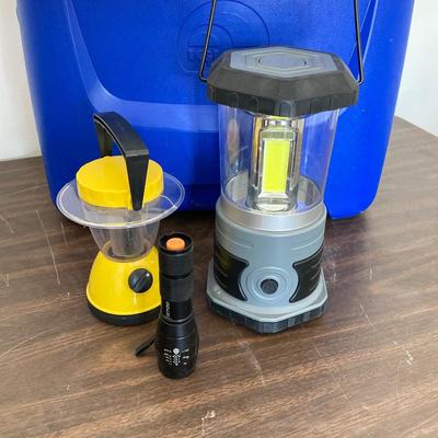 LOT 52: Igloo Island Breeze Cooler, Three Lanterns, Storage Tote with Garden Tools and More