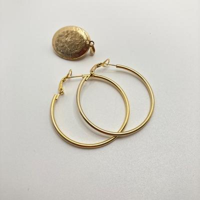 LOT 58: Fashion Jewelry - Anne Klein Puffy Gold Tone Heart Pendant Necklace, Lariat Gold Tone and BlackBead Chain, Locket Pendant and more