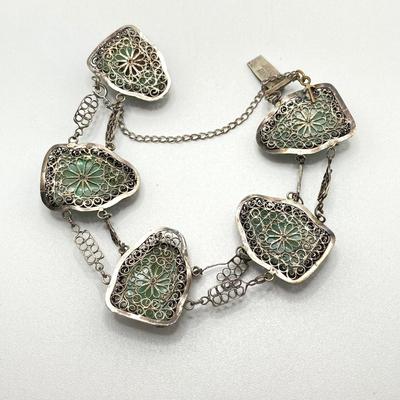 LOT 62: 10KT, TW 21.44g- 10k THC White Gold Carved Jadite Buddha Bracelet