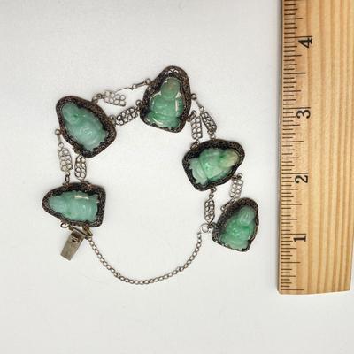 LOT 62: 10KT, TW 21.44g- 10k THC White Gold Carved Jadite Buddha Bracelet
