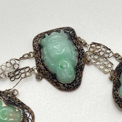 LOT 62: 10KT, TW 21.44g- 10k THC White Gold Carved Jadite Buddha Bracelet