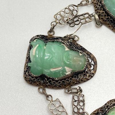 LOT 62: 10KT, TW 21.44g- 10k THC White Gold Carved Jadite Buddha Bracelet