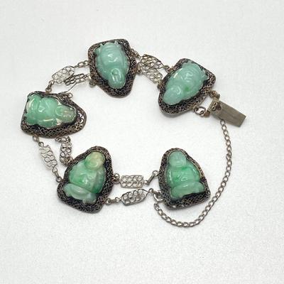 LOT 62: 10KT, TW 21.44g- 10k THC White Gold Carved Jadite Buddha Bracelet