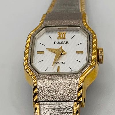 LOT 74: Collection of Fashion Jewelry Bracelets and Wrist Watches by Pulsar, Timex and Vivani