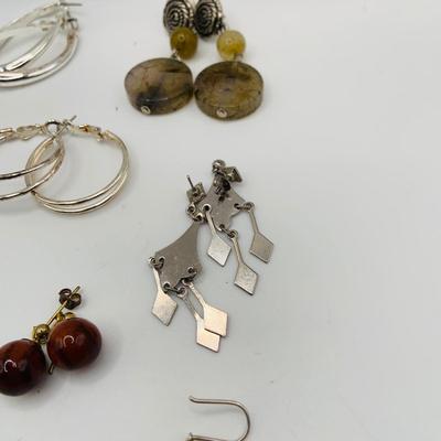 LOT 79: Collection of 20 Pairs of Pierced Earrings