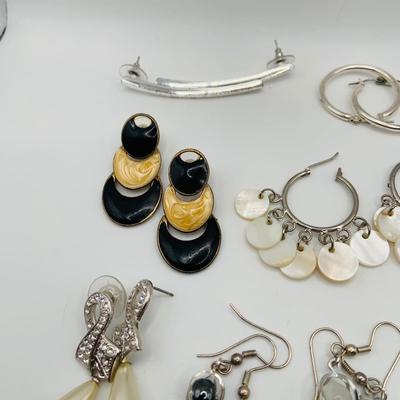 LOT 79: Collection of 20 Pairs of Pierced Earrings