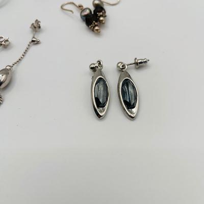 LOT 79: Collection of 20 Pairs of Pierced Earrings