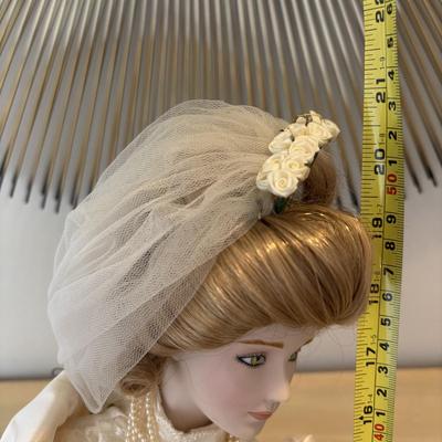 LOT 85: Porcelain Dolls a Bride and Her Flower Girl